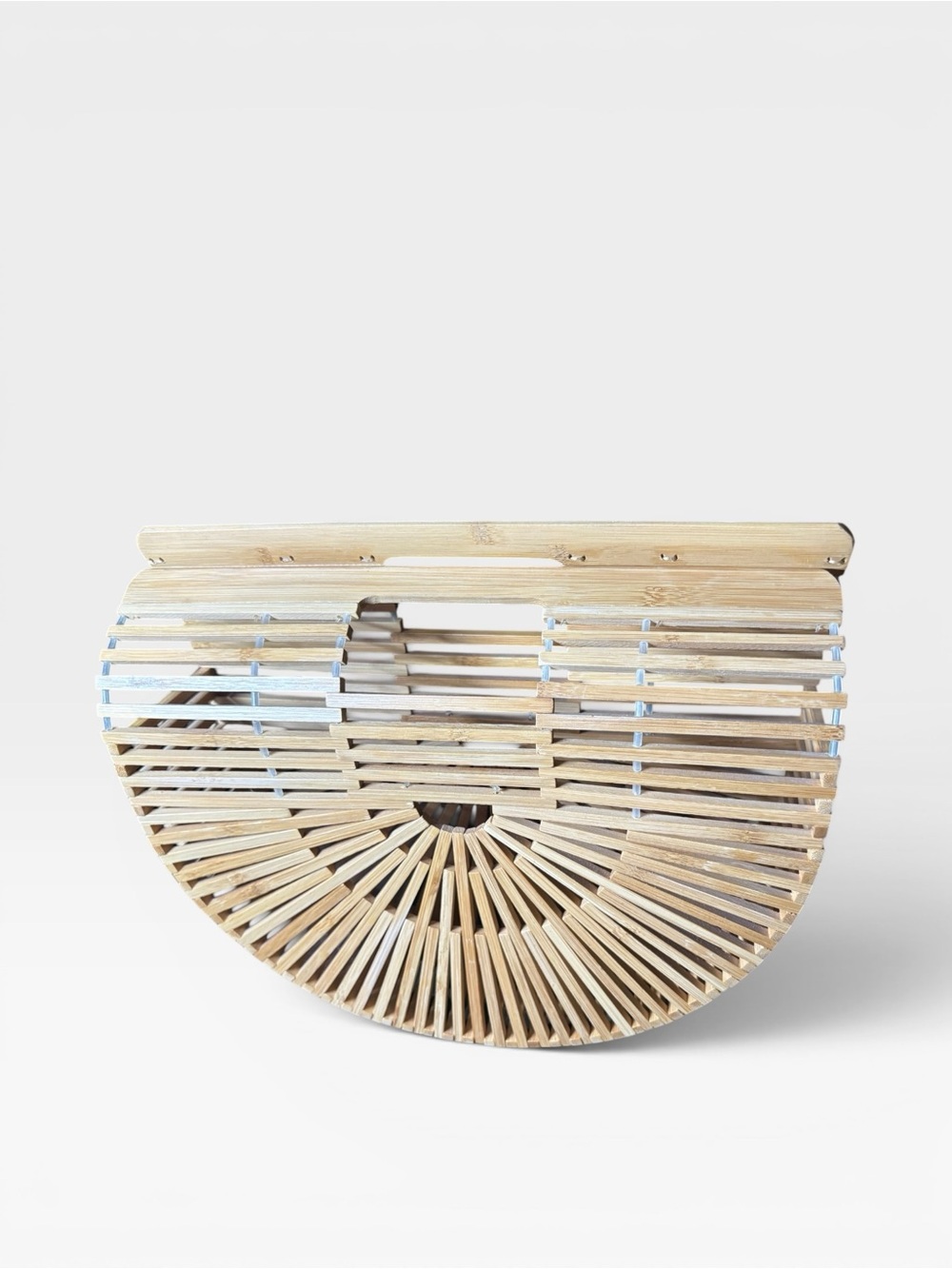 Bamboo rounded handbag 
Unique classic hand bag